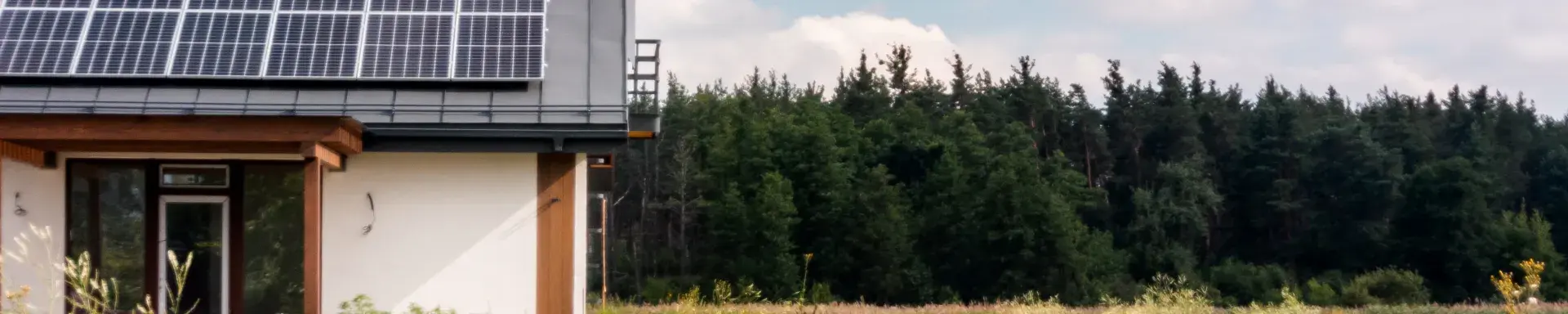Rural house with solar panels on the roof