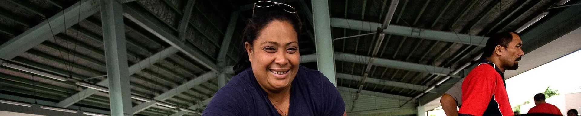 Woman with a fish in Samoa